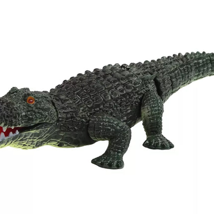 Nuotoliniu būdu valdomas krokodilo žibintuvėlis