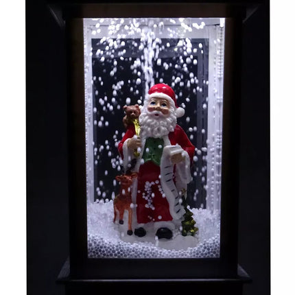 Kalėdinė dekoracija žibintas su Kalėdų Seneliu ir baltu automobiliu, giedamos giesmės