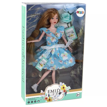 Vaikiška lėlė Emily Spring ilgais plaukais, su mėlyna gėlių suknele