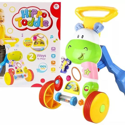 Žaislinis stumdukas kūdikiams „Hippo“ su garsais, barškučiais, čežėjimu ir veidrodėliu