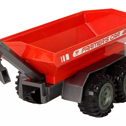 Žalias traktorius su raudona priekaba „Fractal Drive“