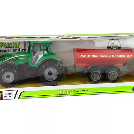 Žalias traktorius su raudona priekaba „Fractal Drive“