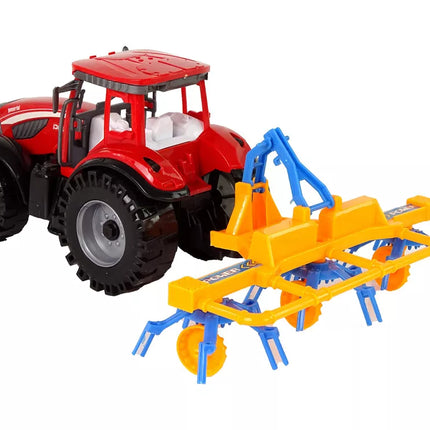 Raudonas traktorius su grėbliu, frikcinis variklis