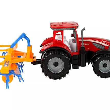 Raudonas traktorius su grėbliu, frikcinis variklis