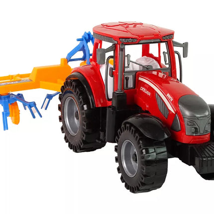 Raudonas traktorius su grėbliu, frikcinis variklis