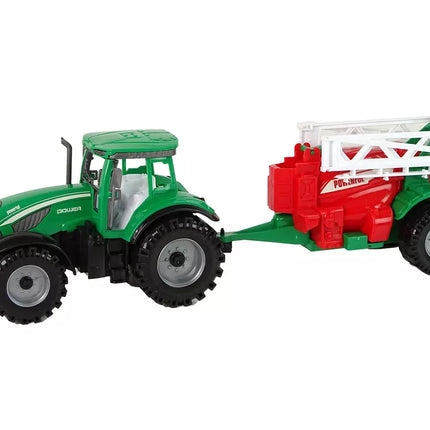 Žalias ūkinis traktorius su raudonu ir žaliu purkštuvu, varomas frikciniu būdu