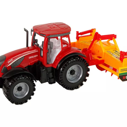 Raudonas traktorius su oranžiniu kultivatoriaus pavaros mechanizmu