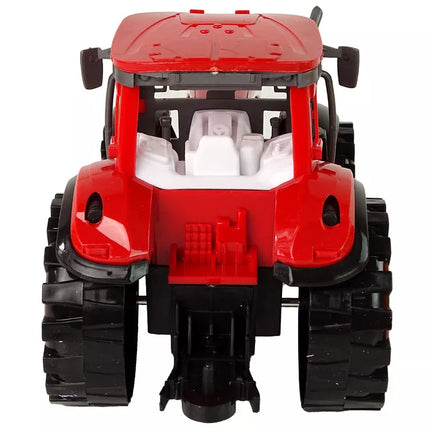 Raudonas traktorius su oranžiniu kultivatoriaus pavaros mechanizmu