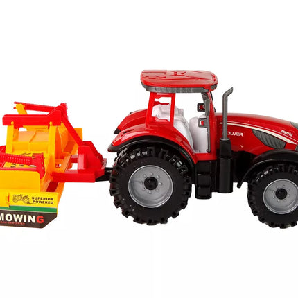 Raudonas traktorius su oranžiniu kultivatoriaus pavaros mechanizmu