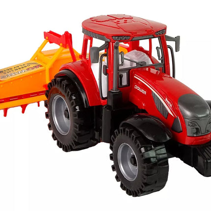 Raudonas traktorius su oranžiniu kultivatoriaus pavaros mechanizmu