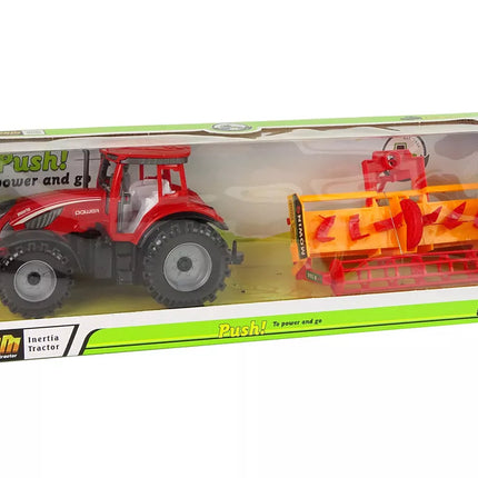 Raudonas traktorius su oranžiniu kultivatoriaus pavaros mechanizmu