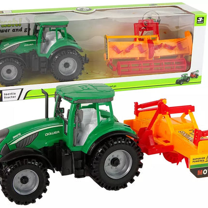 Žalias traktorius su oranžiniu kultivatoriumi vaikams