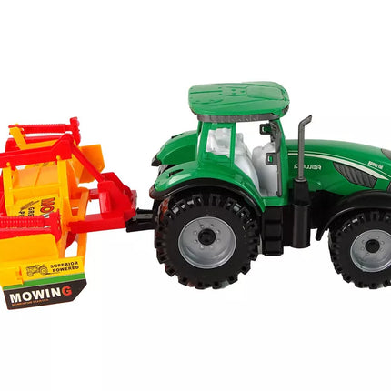Žalias traktorius su oranžiniu kultivatoriumi vaikams