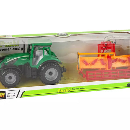 Žalias traktorius su oranžiniu kultivatoriumi vaikams