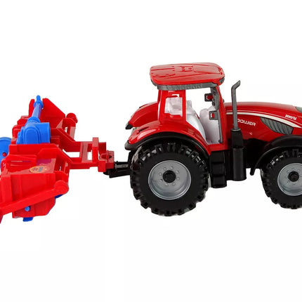 Raudonas traktorius su plūgu, frikcinis variklis