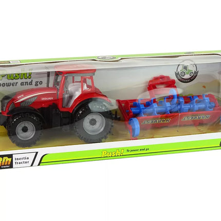 Raudonas traktorius su plūgu, frikcinis variklis