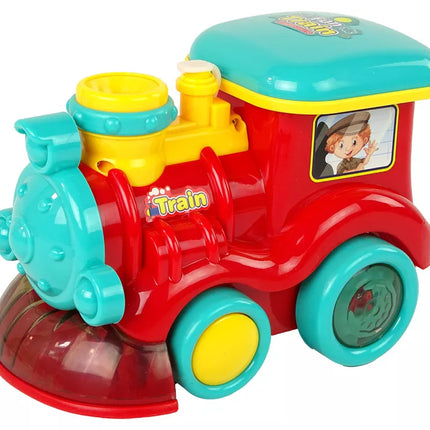 Muilo burbulų lokomotyvas važiuoja su šviesomis ir garsais