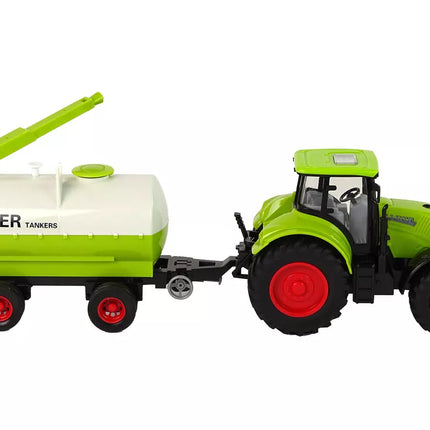 Traktorius su didelių ratų priekaba žalias ūkis