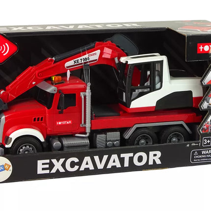 Sunkvežimis su ekskavatoriumi traktoriumi Ekskavatoriaus garsai šviesos