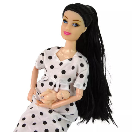 Lėlė nėščia su kūdikiu, vilkinti balta suknele