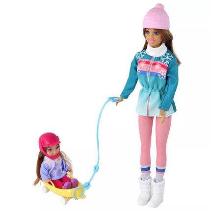 Anlily lėlės mama su dukra važinėja rogutėmis