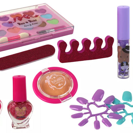 Grožio makiažo ir nagų rinkinys rožiniame lagamine