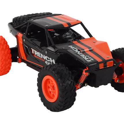 Valdomas nuotoliniu būdu visureigis R/C 1:24 oranžinis