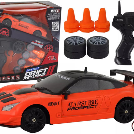 Nuotoliniu būdu valdomas sportinis automobilis R/C 1:24 oranžinis su keičiamais ratais