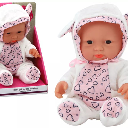 Maža lėlytė kūdikis, baltais drabužiais, skrybėlė, kaspinas, ausytės