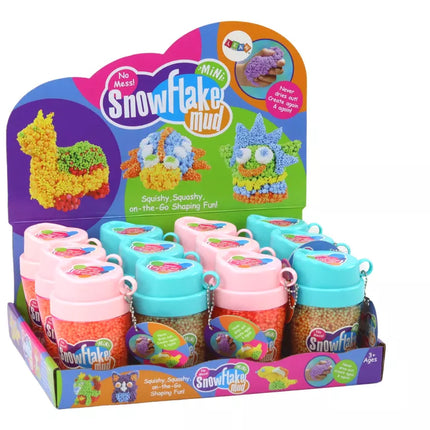 Purūs putplasčio kamuoliukai oranžiniame puodelyje