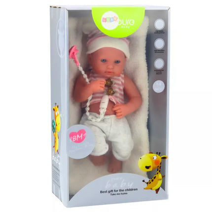 Lėlė su baltais ir rožiniais drabužiais, kepure, čiulptuku ir antklode