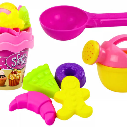 Smėlio kibirėlių rinkinys, laistytuvas, formelės, rožinės spalvos saldainiai, 8 vnt.