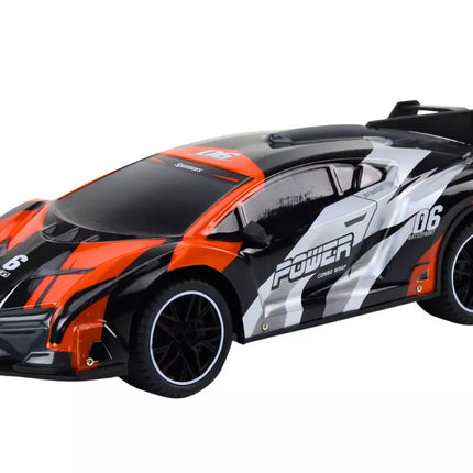 Nuotoliniu būdu valdomas sportinis automobilis RC 1:10 oranžinis, greitis iki 25 km/h