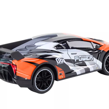 Nuotoliniu būdu valdomas sportinis automobilis RC 1:10 oranžinis, greitis iki 25 km/h