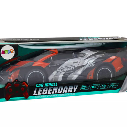 Nuotoliniu būdu valdomas sportinis automobilis RC 1:10 oranžinis, greitis iki 25 km/h