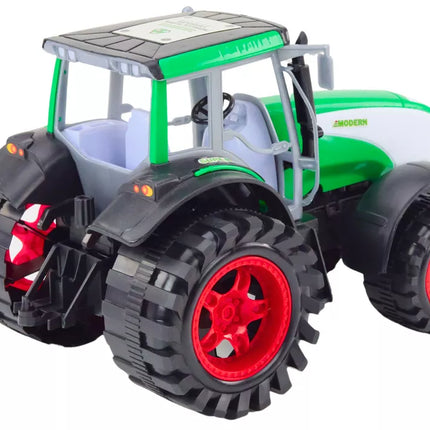 Didelis žemės ūkio traktorius, varomas žalia spalva