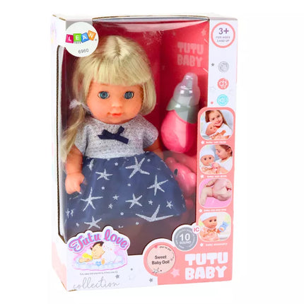 Lėlė su tamsiai mėlyna suknele, pisuaru, buteliuku, barškučio garsais