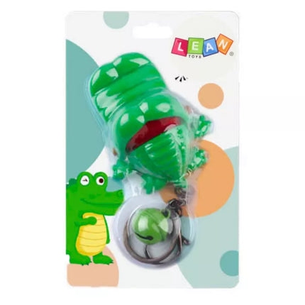 Žalias raktų pakabukas-varpelis „Kandantis krokodilas“