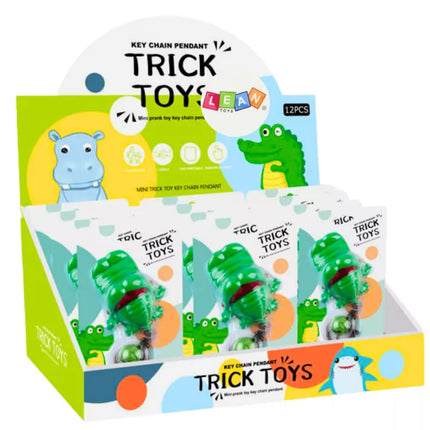 Žalias raktų pakabukas-varpelis „Kandantis krokodilas“