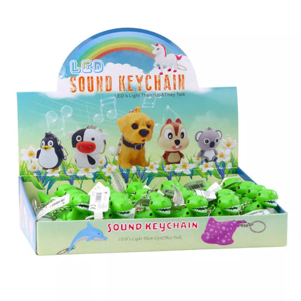 Dinozaur kuprinės raktų pakabukas su LED žibintuvėliu ir garsais, žalias