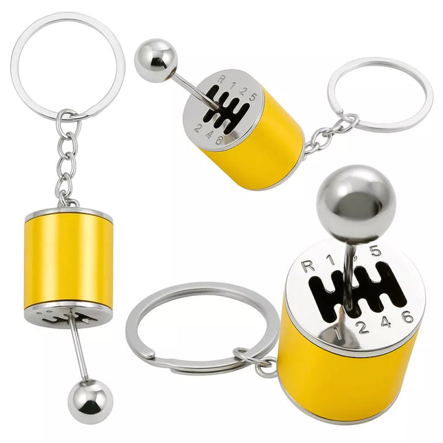 Metalinis raktų pakabukas su judančia pavarų dėže, auksinis