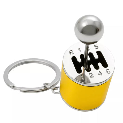 Metalinis raktų pakabukas su judančia pavarų dėže, auksinis