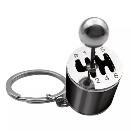 Metalinis raktų pakabukas su judančia pavarų dėže, juodas