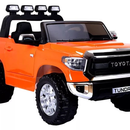Toyota Tundra oranžinės spalvos - elektromobilis