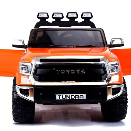 Toyota Tundra oranžinės spalvos - elektromobilis