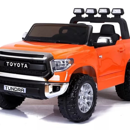 Toyota Tundra oranžinės spalvos - elektromobilis