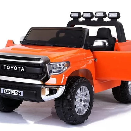 Toyota Tundra oranžinės spalvos - elektromobilis
