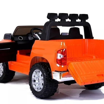 Toyota Tundra oranžinės spalvos - elektromobilis