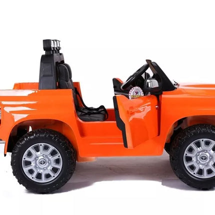 Toyota Tundra oranžinės spalvos - elektromobilis