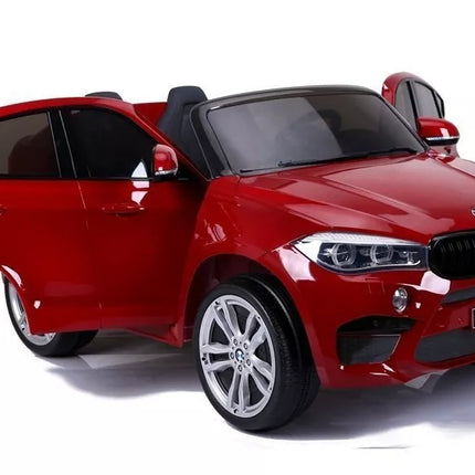 Naujas BMW X6M raudonos spalvos – elektrinis važiavimo automobilis